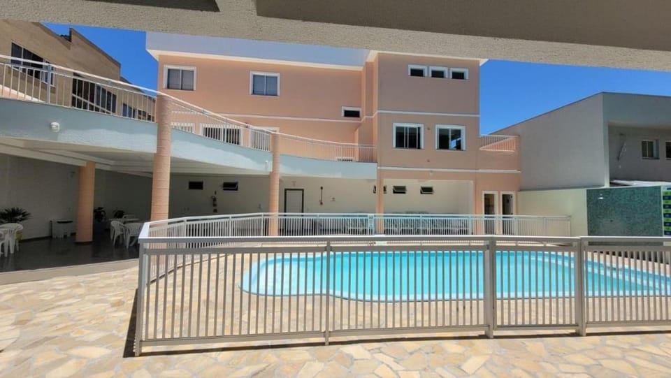 Property building, Day, Pool view, Swimming pool, sunbed