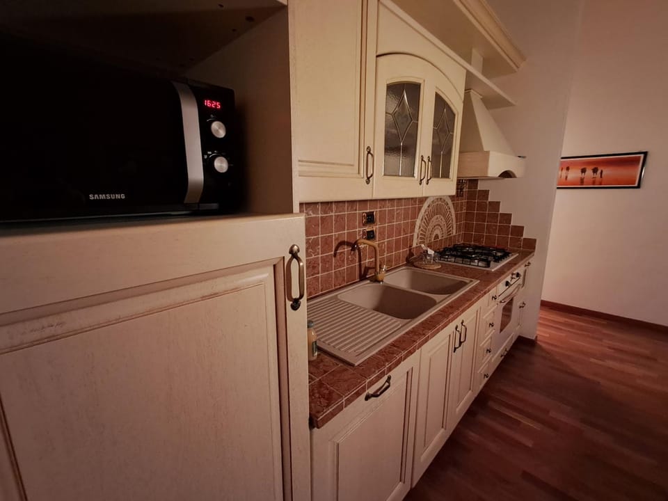 Kitchen or kitchenette, microwave