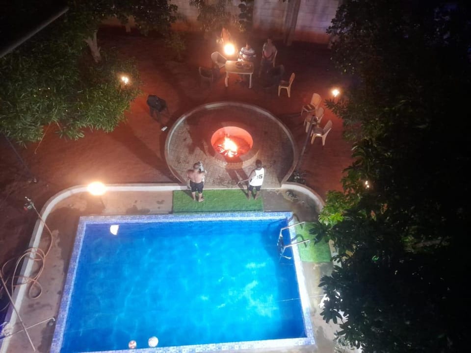 Night, BBQ facilities, Pool view, Swimming pool