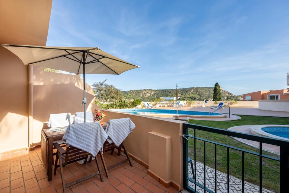 Property building, Patio, Swimming pool