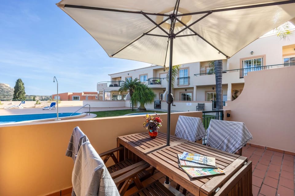 Property building, Patio, Swimming pool