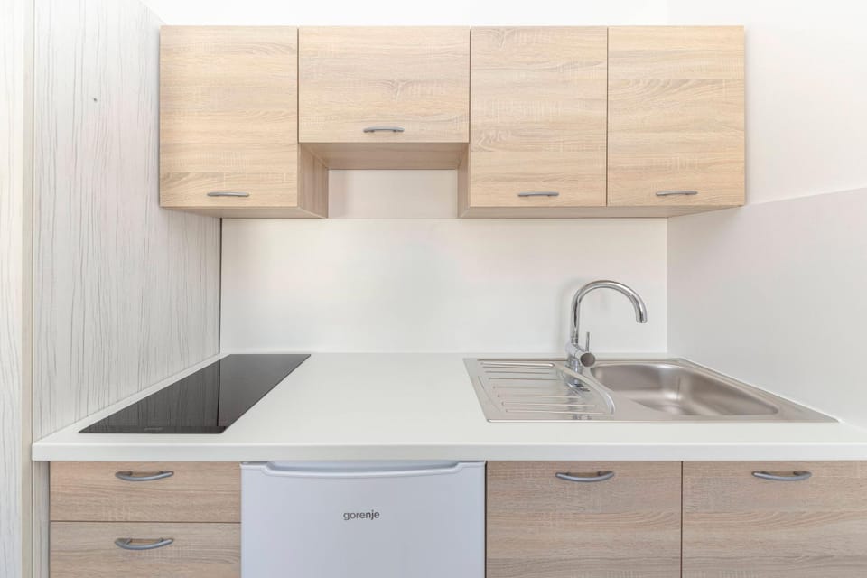 Kitchen or kitchenette, stove, kitchen