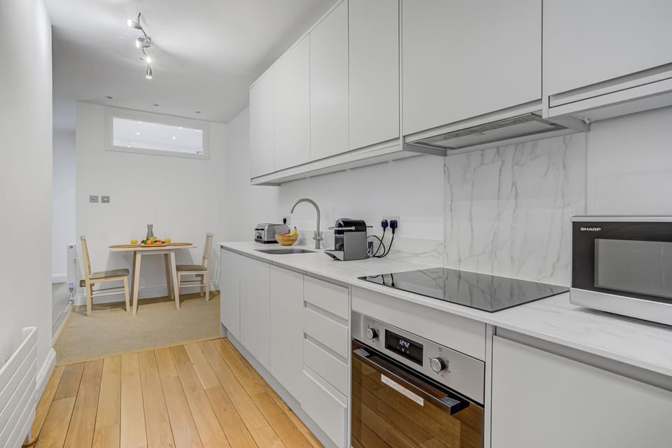 Kitchen or kitchenette, Dining area, dishwasher, oven, stove, toaster