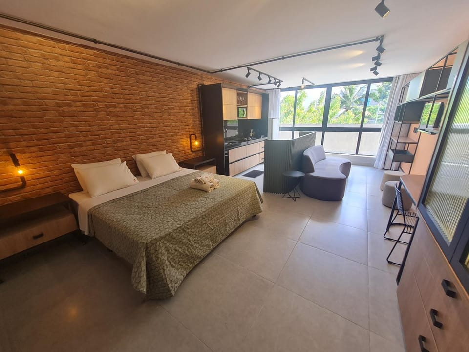 Bed, TV and multimedia, Living room, Photo of the whole room, Seating area, Bedroom