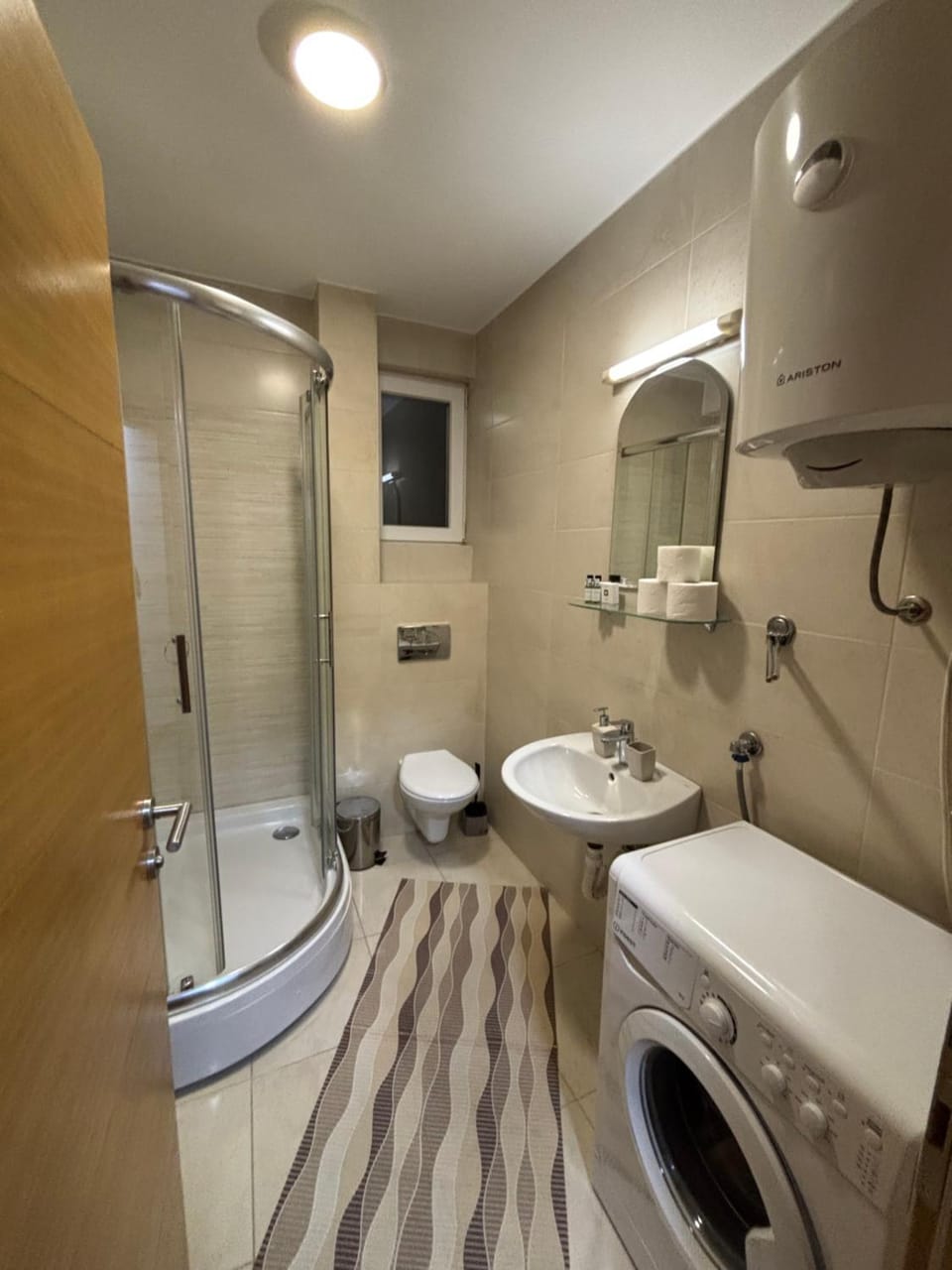Shower, Toilet, towels, washing machine
