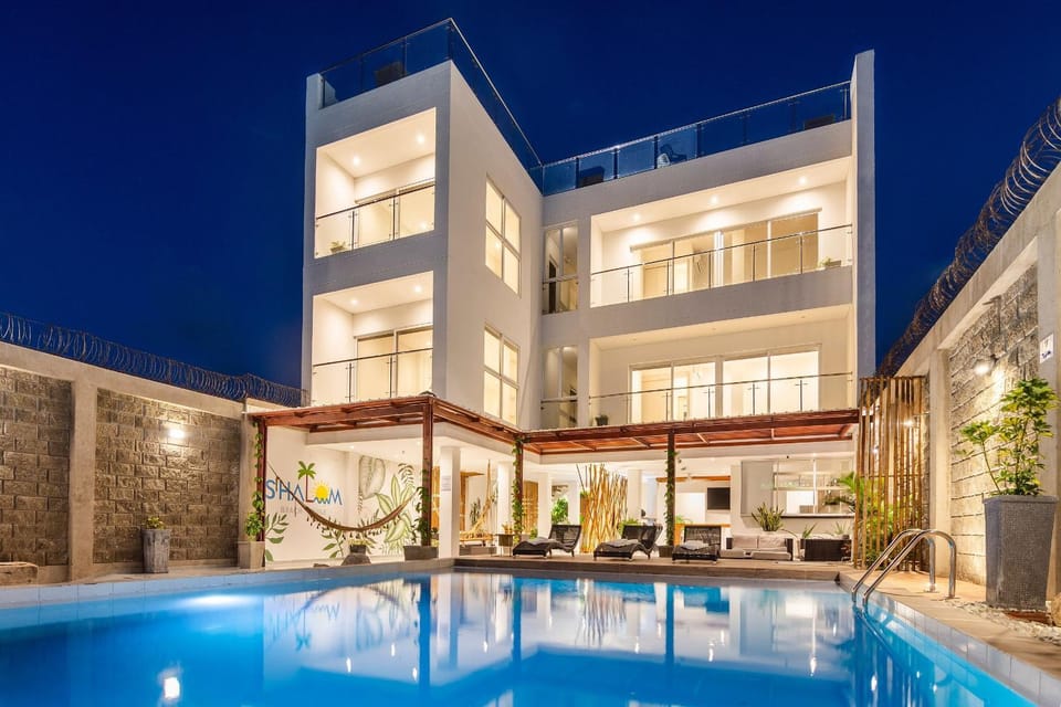 Property building, Facade/entrance, Night, Pool view