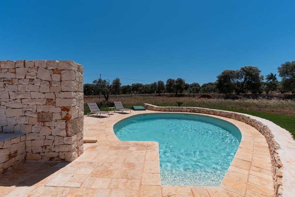 Property building, Living room, Swimming pool