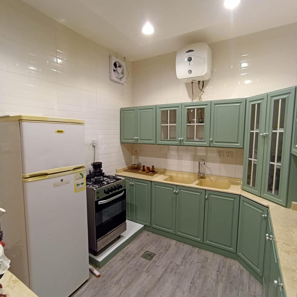 Kitchen or kitchenette, oven, stove