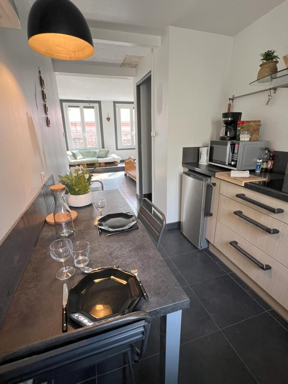 Dining area, microwave, stove, kitchen