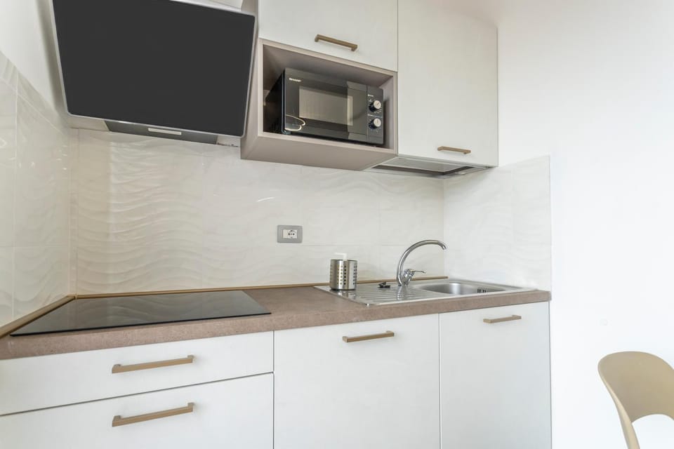Kitchen or kitchenette, stove, kitchen
