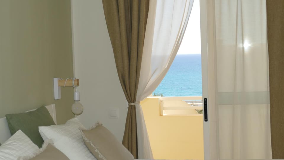 Natural landscape, View (from property/room), Bedroom, Sea view