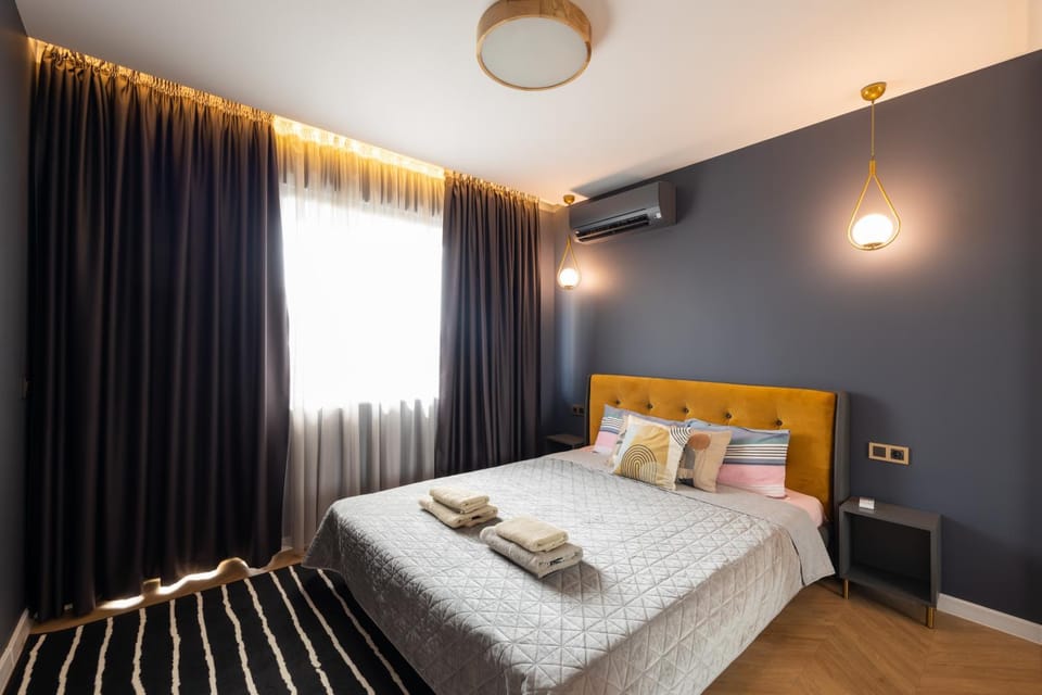 Bed, Photo of the whole room, Bedroom, towels, air conditioner