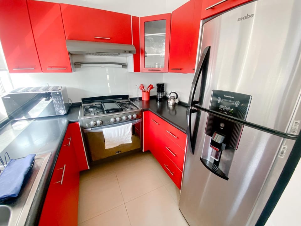 Kitchen or kitchenette, oven