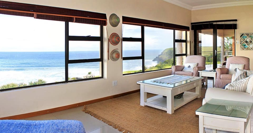 Natural landscape, View (from property/room), Living room, Seating area, Sea view