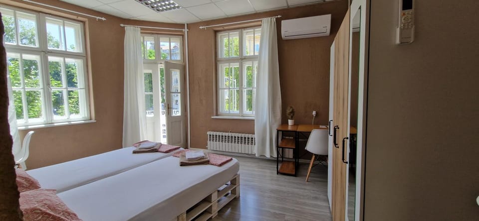 Bed, Photo of the whole room, Bedroom, towels, air conditioner