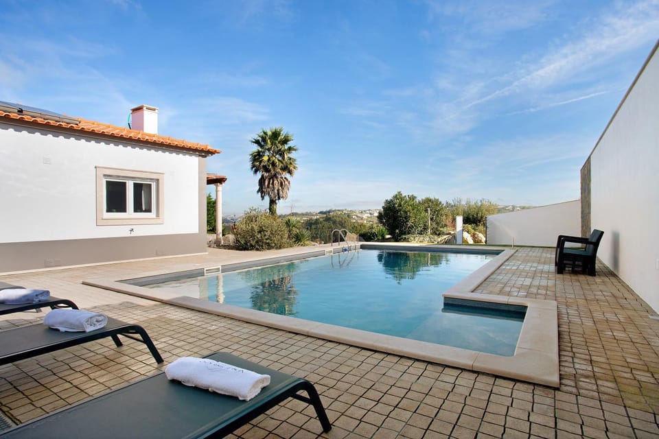 Property building, Living room, Swimming pool