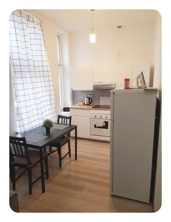 Kitchen or kitchenette, oven