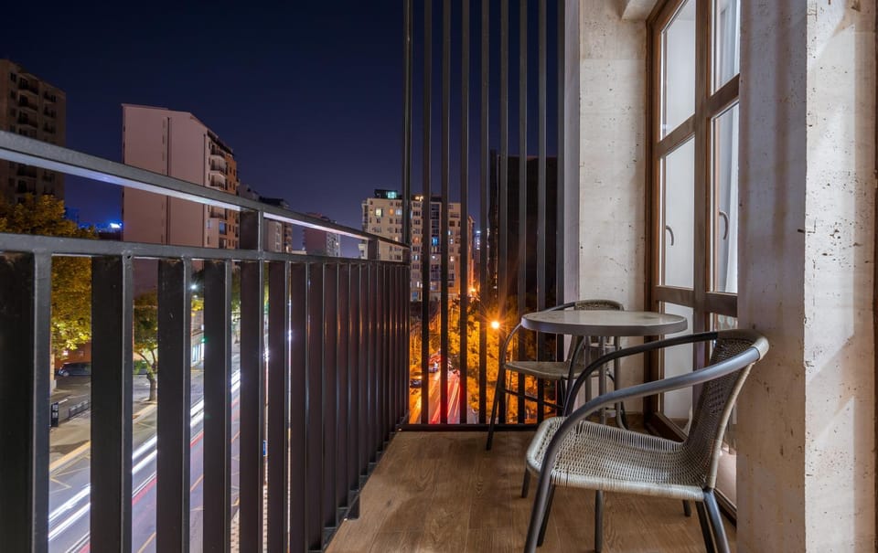 Property building, Patio, Night, View (from property/room), Balcony/Terrace, Dining area