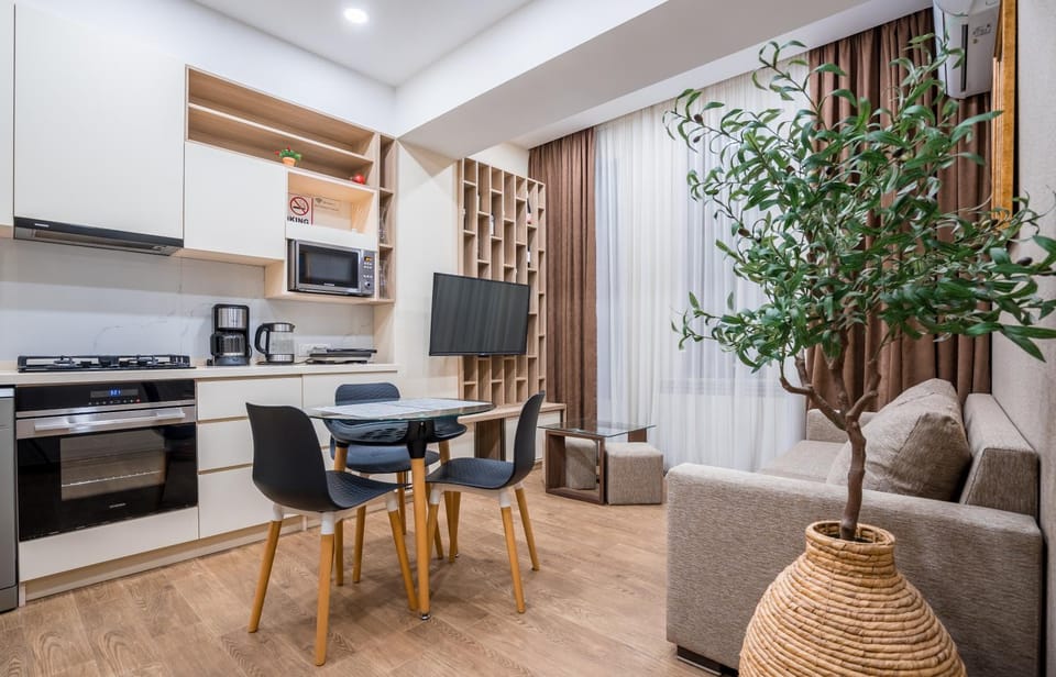TV and multimedia, Kitchen or kitchenette, Living room, Seating area, Dining area, dishwasher, minibar, oven, pet friendly, stove, toaster