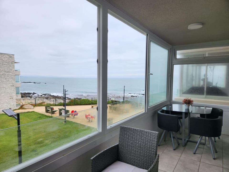 View (from property/room), Balcony/Terrace, Living room, Dining area, Beach, Sea view