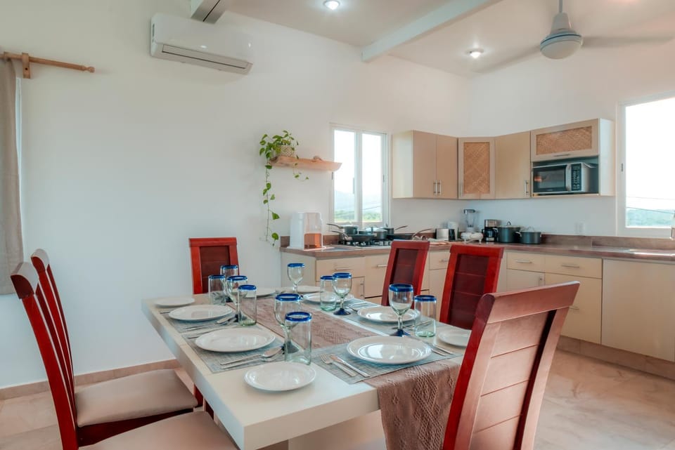 Kitchen or kitchenette, Seating area, Dining area, stove, air conditioner