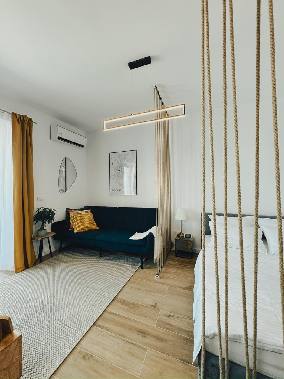 Bed, Living room, Seating area, Bedroom, air conditioner