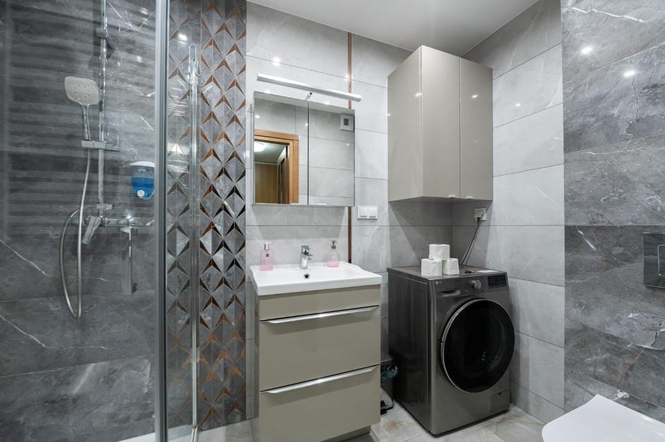 Shower, Bathroom, towels, washing machine, dryer