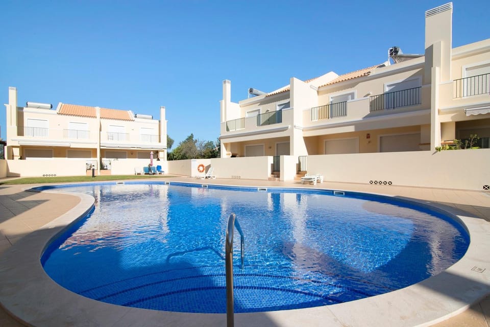 Property building, Living room, Swimming pool