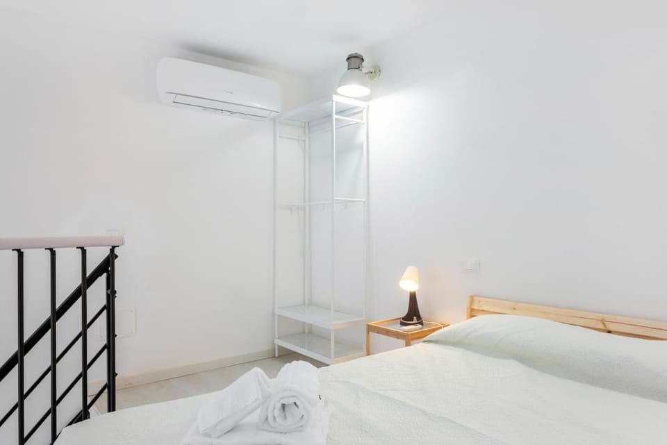 Bed, Photo of the whole room, Bedroom, towels, air conditioner