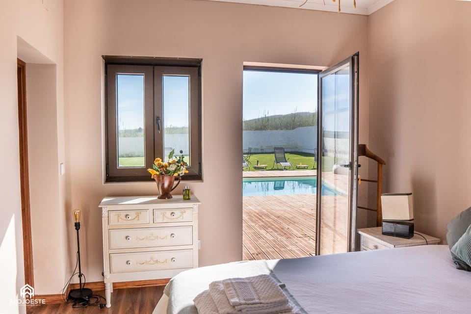 Patio, Bed, Natural landscape, Bedroom, Pool view, Swimming pool