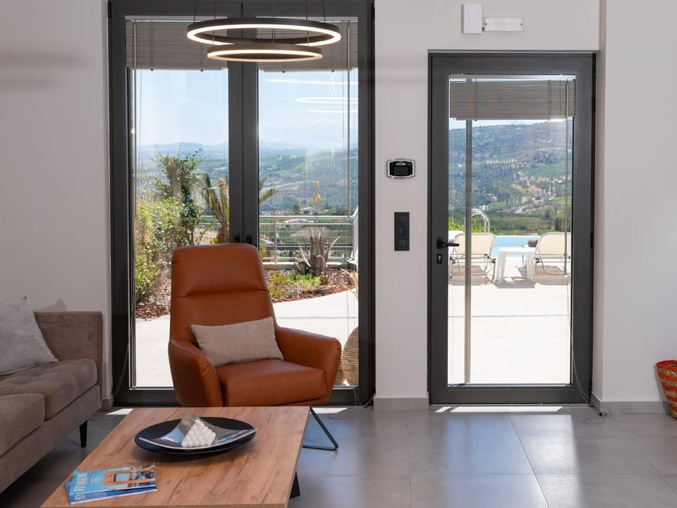 Natural landscape, View (from property/room), Living room, Seating area, Mountain view