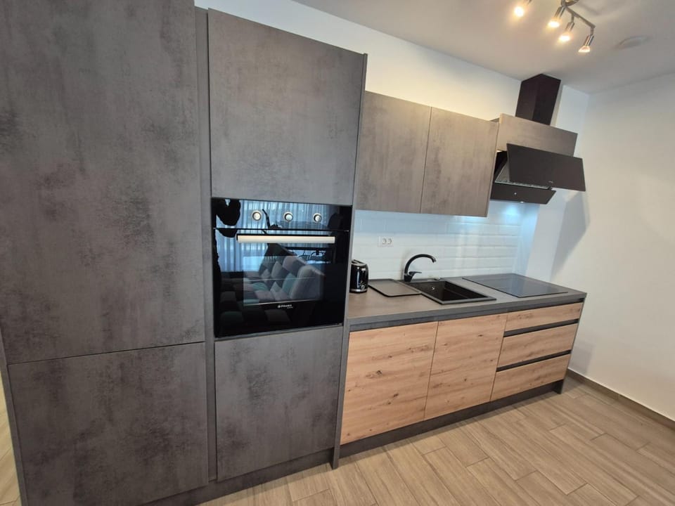 Kitchen or kitchenette, stove