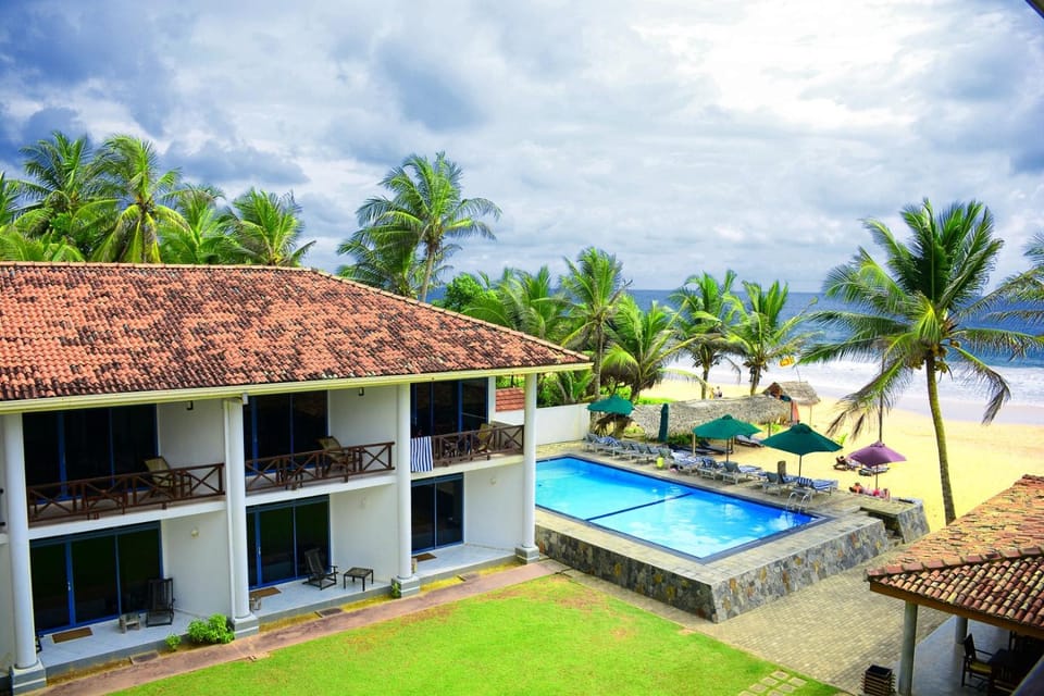 Property building, Garden, Beach, Swimming pool