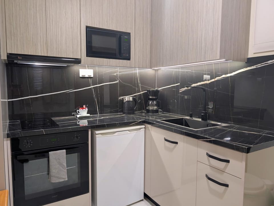 Kitchen or kitchenette, stove