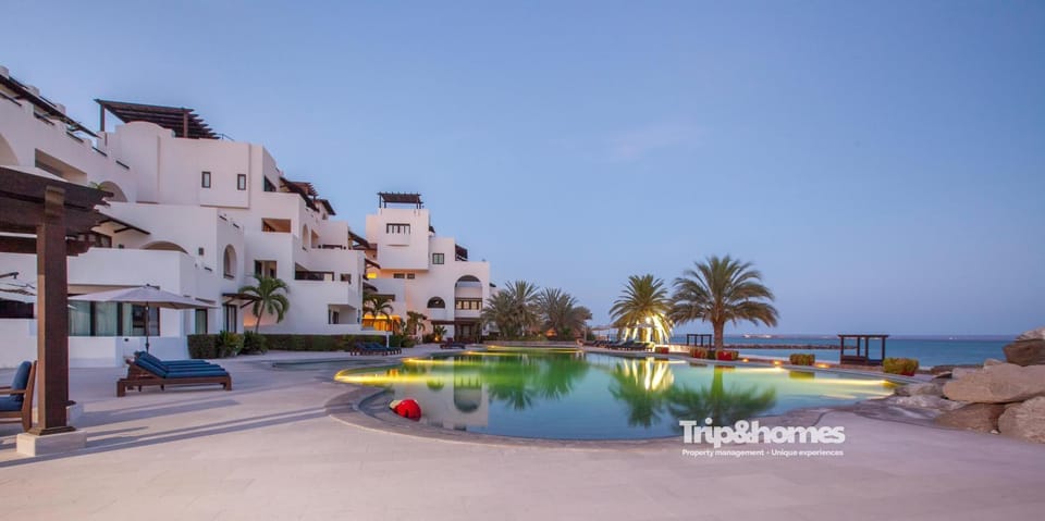 Property building, Natural landscape, Beach, Pool view, Sea view, Swimming pool