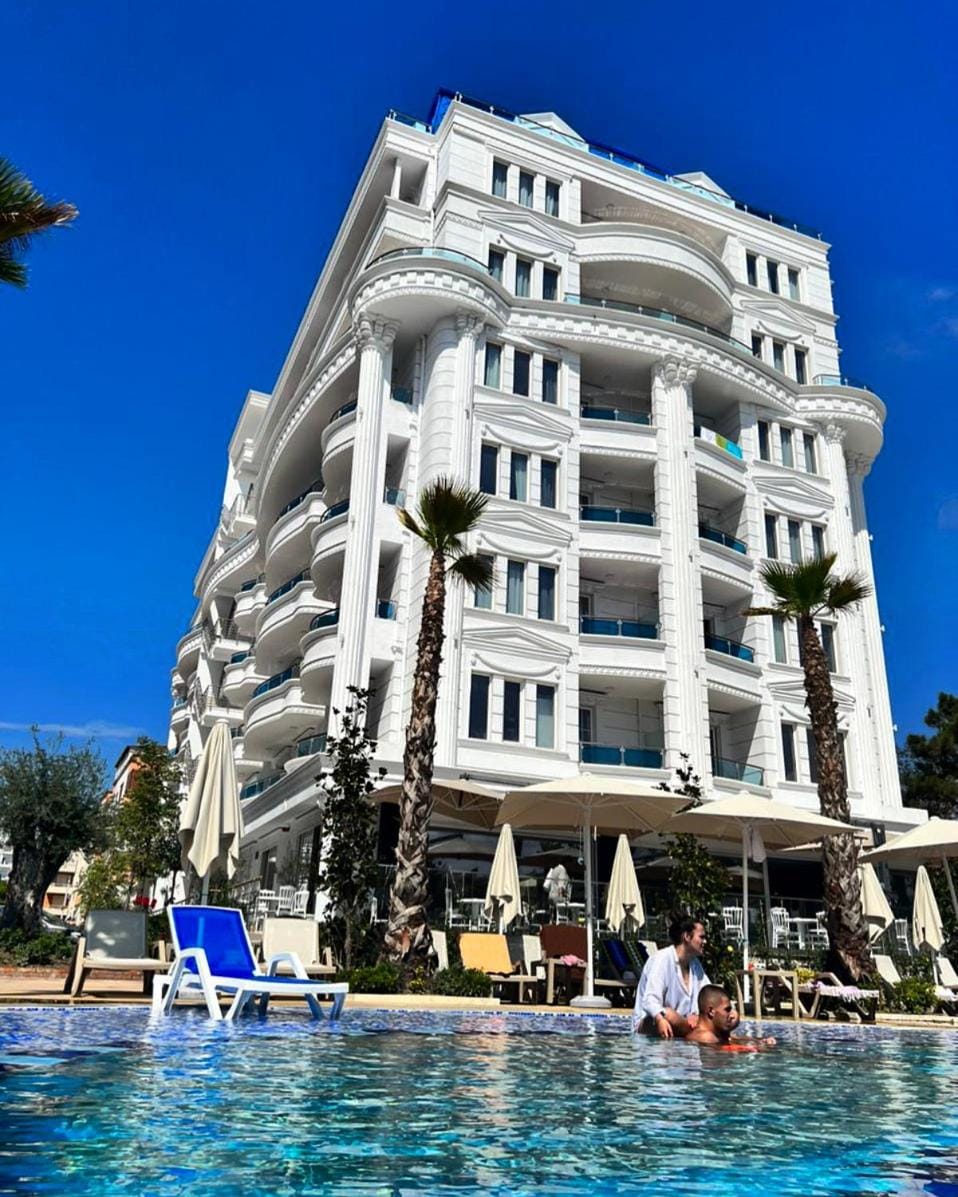 Property building, Day, Pool view, Swimming pool