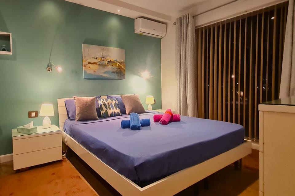Bed, Photo of the whole room, Bedroom, towels, air conditioner