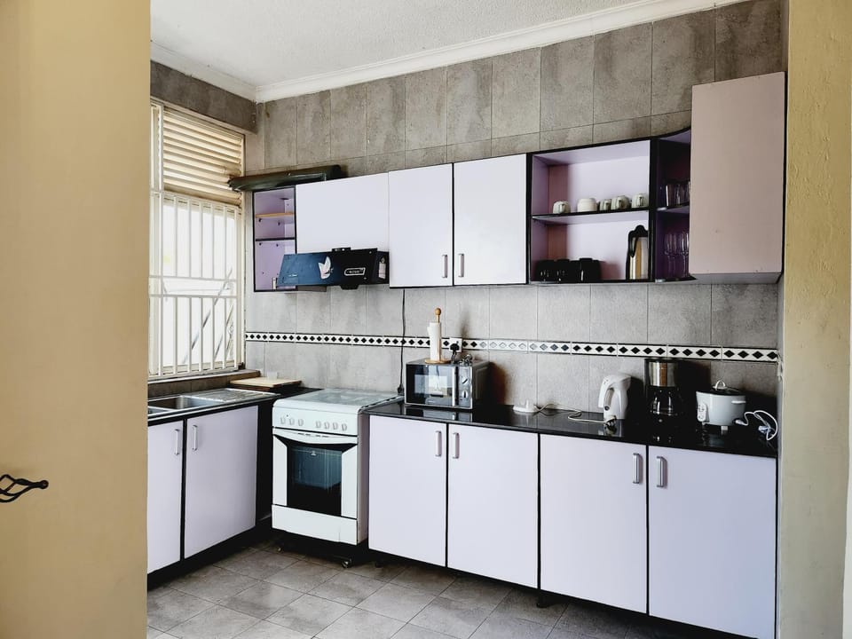 Kitchen or kitchenette, oven, stove