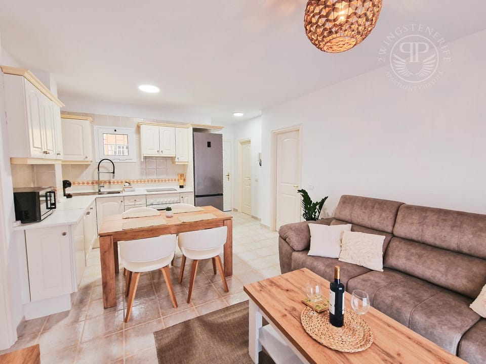 Kitchen or kitchenette, Living room, Seating area, Dining area