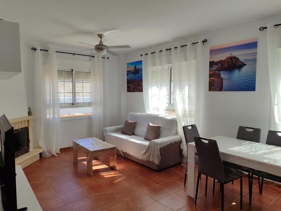 Natural landscape, TV and multimedia, Living room, Photo of the whole room, Seating area, Dining area, fireplace, flat iron, internet, air conditioner