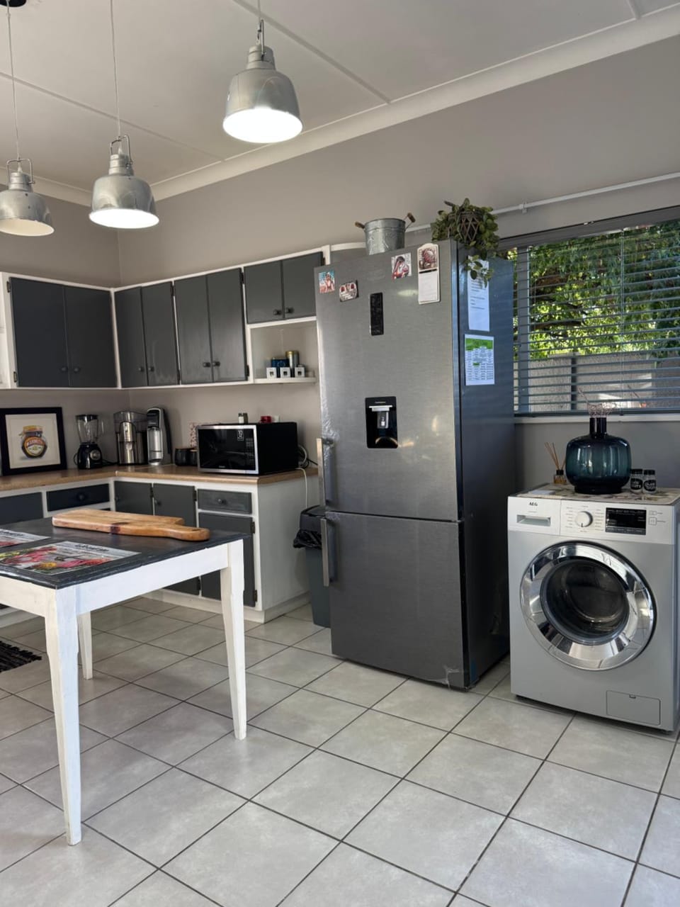 Kitchen or kitchenette, washing machine