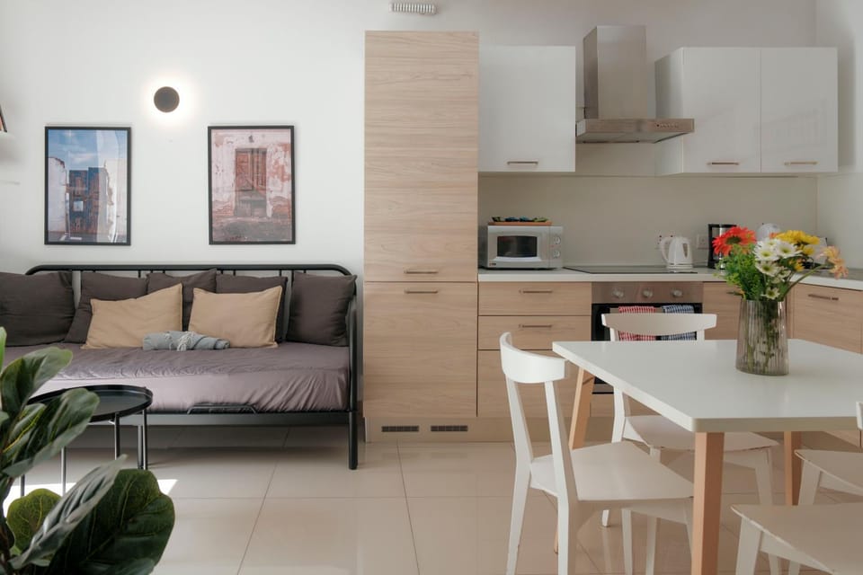 Living room, Seating area, Dining area, oven, stove, toaster
