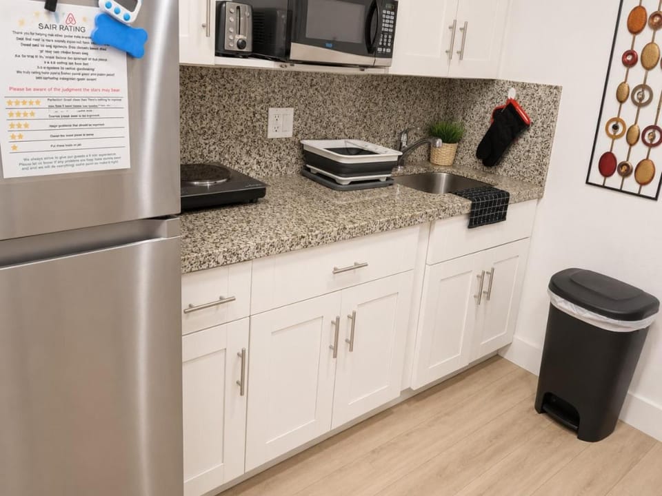 Kitchen or kitchenette, stove, toaster