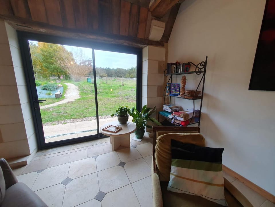 Communal lounge/ TV room, Children play ground, Living room, Seating area, Garden view