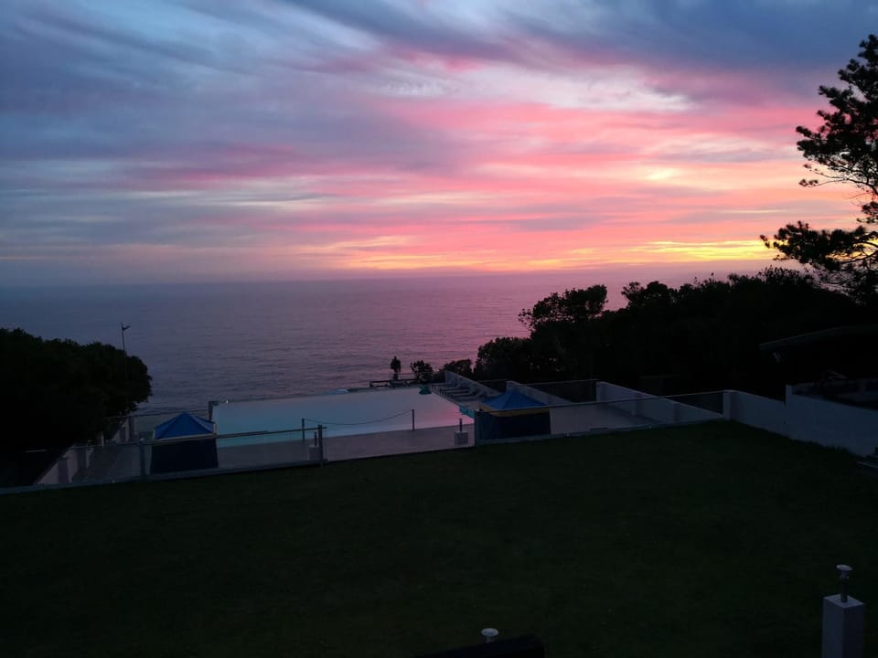 Property building, Swimming pool, Sunset