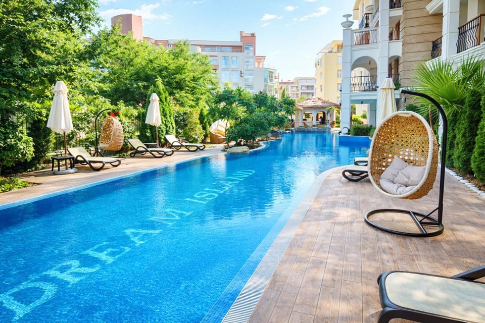Property building, Swimming pool, Swimming pool, sunbed