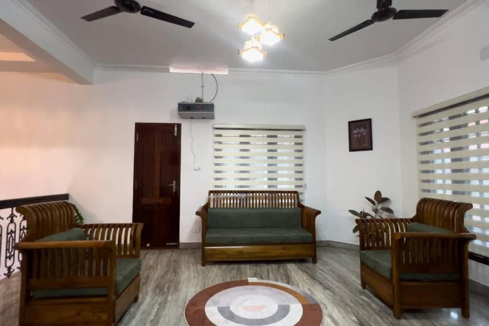TV and multimedia, Living room, Seating area, fireplace, air conditioner