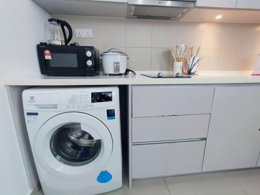 Kitchen or kitchenette, washing machine