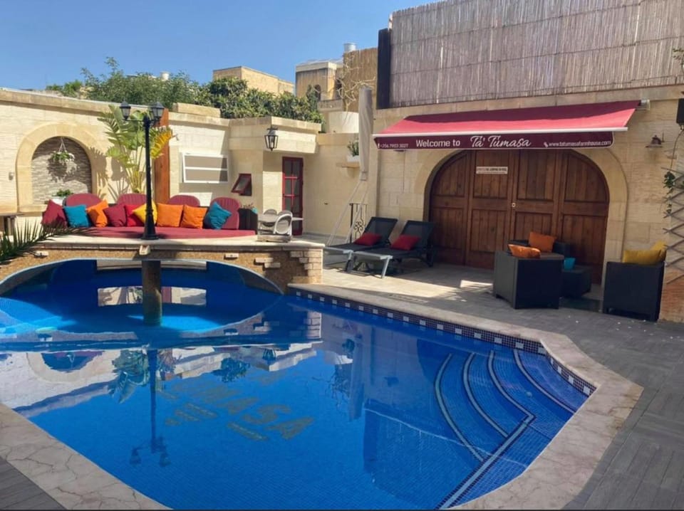 Renovated Farmhouse with Heated Pool & Gym, right in Village Centre Villa in Malta