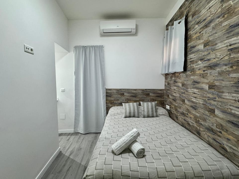Bed, Photo of the whole room, Bedroom, towels, air conditioner